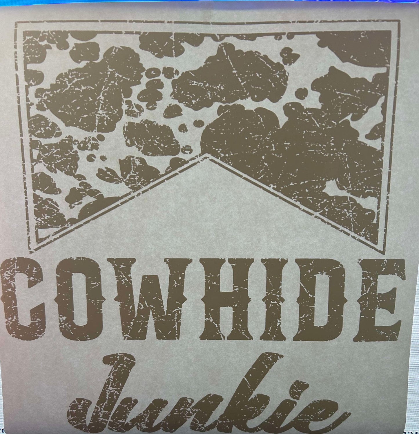 COWHIDE JUNKIE